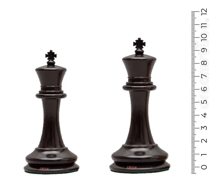 3.75 to 4 inch black chess king pieces with measuring tape for reference.