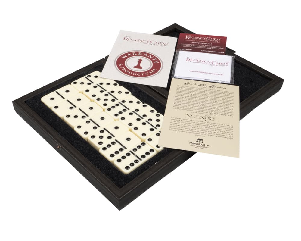 Manopoulos Luxury Dominoes Box Set in wooden case with weighty resin pieces and Regency Chess Company documentation on display