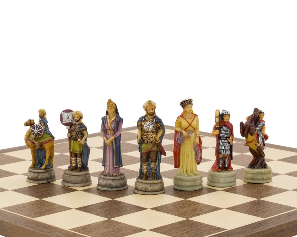 The Romans Vs Arabs Hand-painted themed chess pieces by Italfama displayed on a chessboard. Exquisite craftsmanship with historical figures.