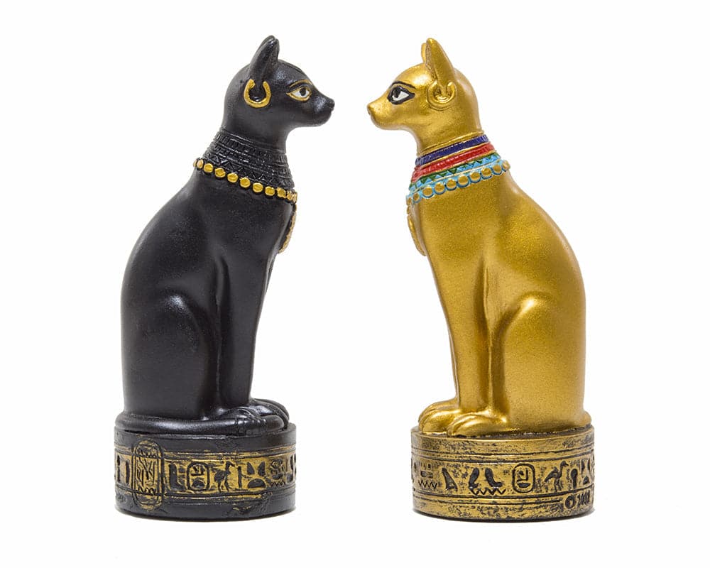 Hand-painted Ancient Egyptian themed chess pieces by Italfama depicting cats in black and gold.