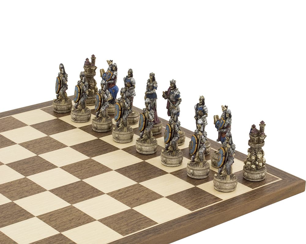 The Zombie Hand painted themed chess pieces by Italfama on a chessboard, featuring exquisite and ornate details.