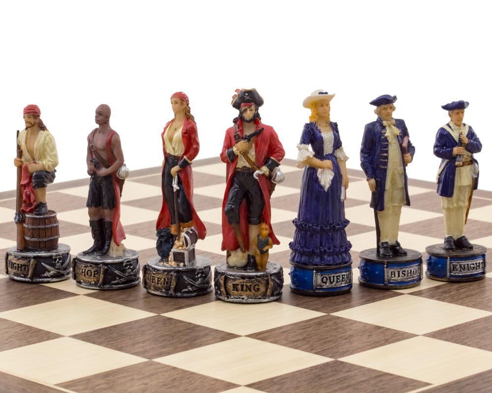 Hand painted Pirates Vs Navy themed chess pieces by Italfama, featuring detailed characters on a chessboard with 3.25 inch king.