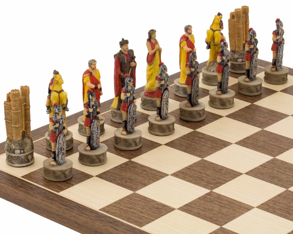 The Battle of Troy hand-painted resin chess pieces by Italfama on a chessboard, featuring Greek and Spartan armies.