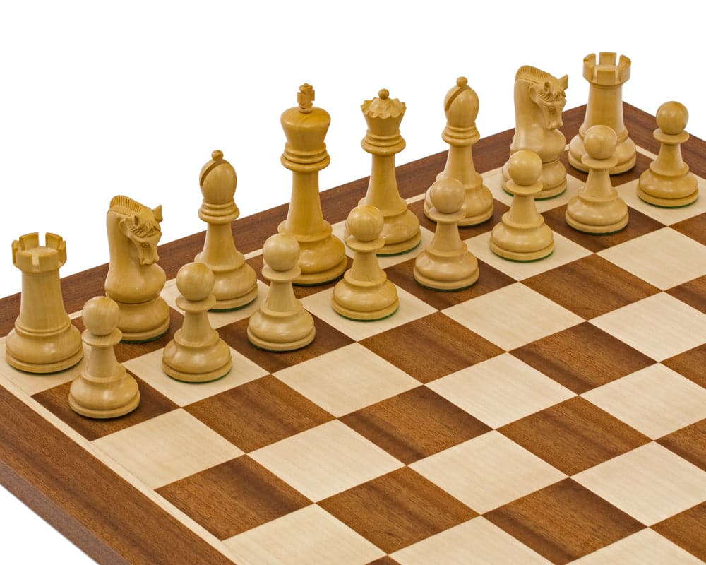 Handcrafted Staunton chess pieces in light wood on a high-quality wooden chessboard, featuring detailed knights and bishops.