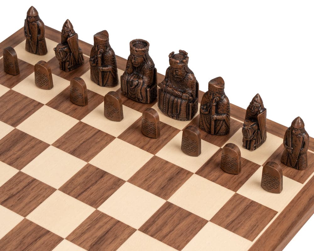 Isle of Lewis official chessmen on chessboard, medium size 2.75 inch King height, crafted in the UK near Devon and Somerset.