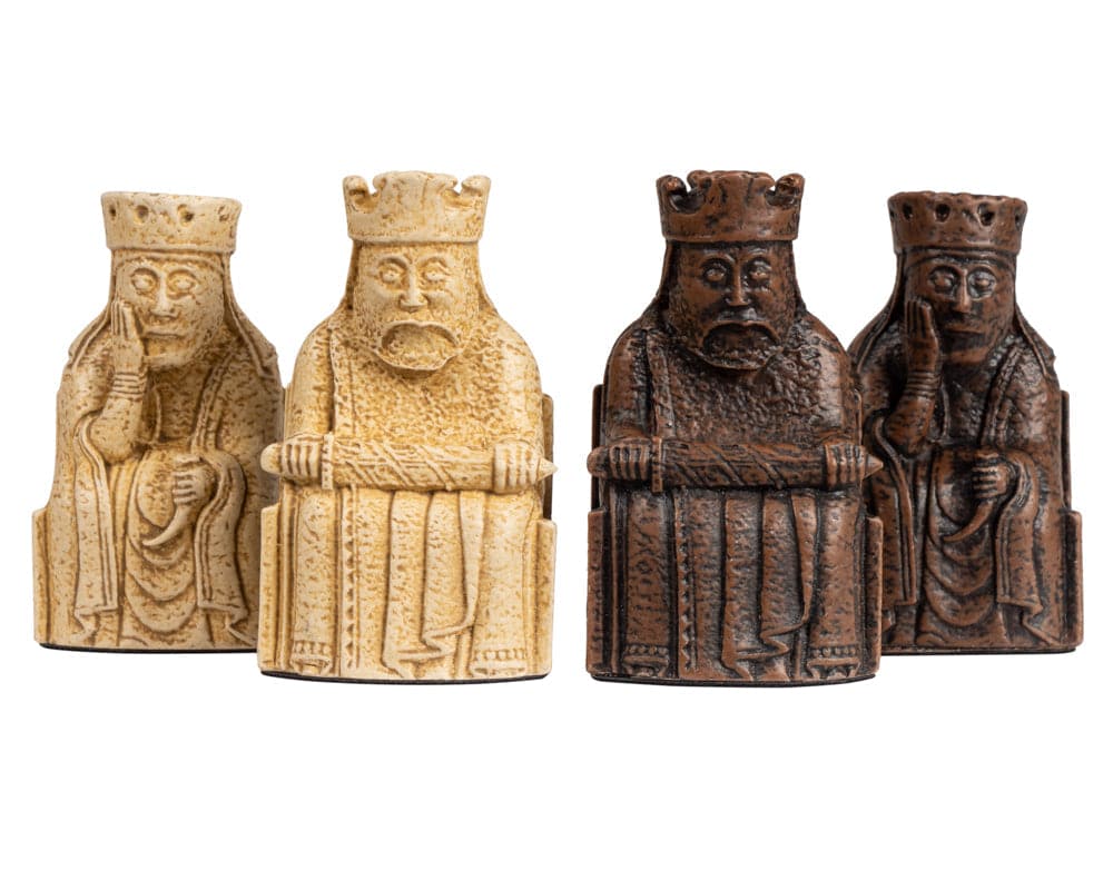 Medium size 2.75 inch Isle of Lewis official chessmen set featuring four intricately crafted pieces in light and dark colors