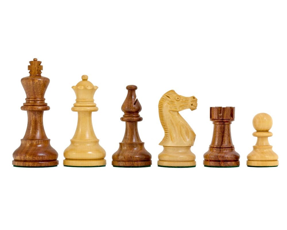 The Rochester Ebony Chessmen 4 inch - hand-crafted chess pieces displayed against a white background, showcasing the intricate design and craftsmanship.