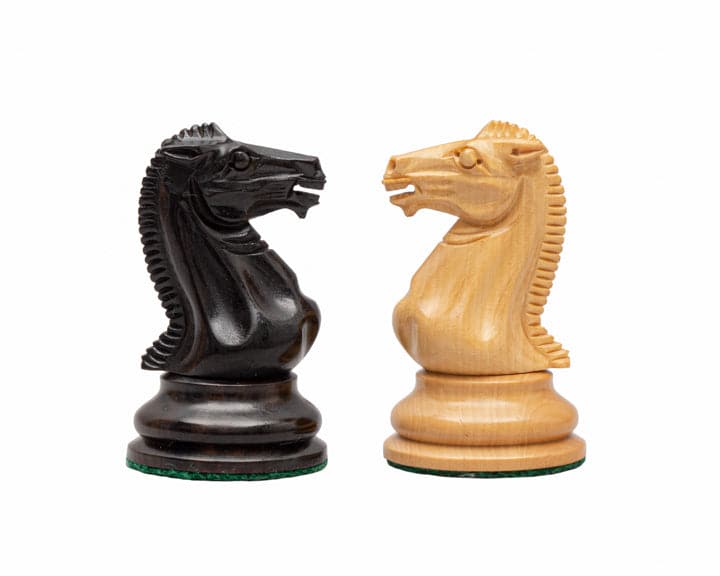 The Rochester Ebony Chessmen 4 inch Knights - Beautifully crafted chess pieces in black and natural wood, high quality and great value.