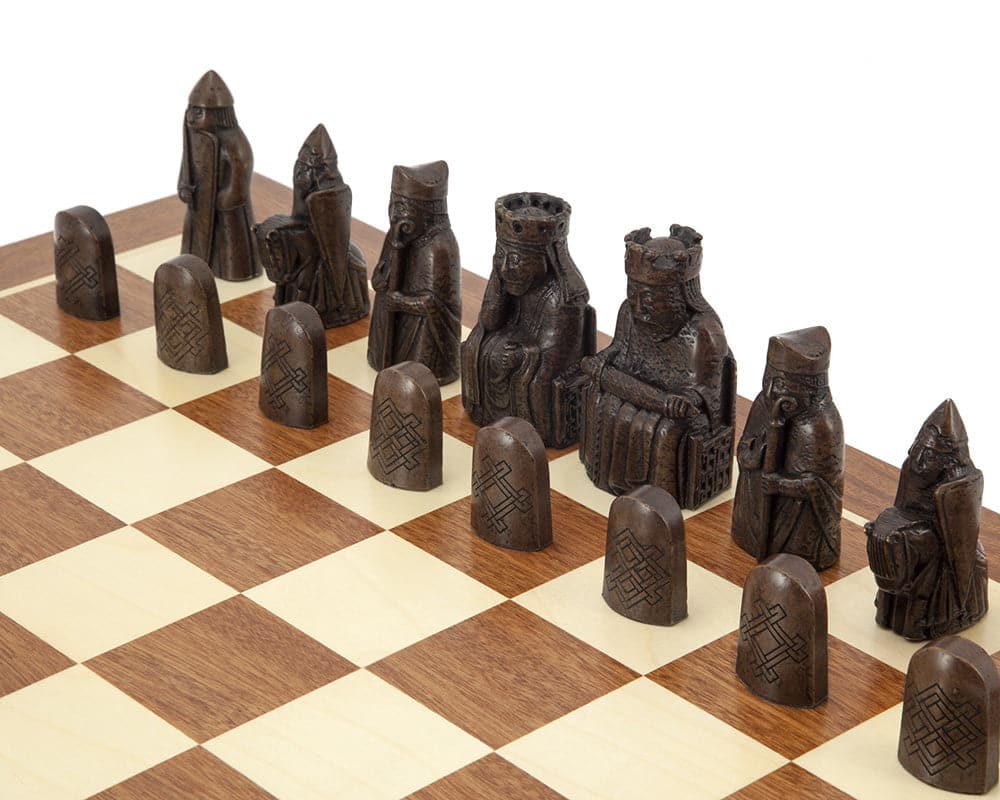 Isle of Lewis large mahogany chess set with intricately detailed chessmen on a mahogany and maple chess board.