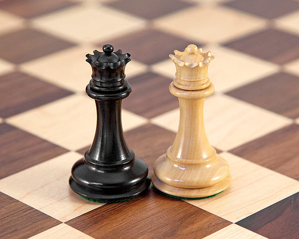 Sovereign Ebonised and Walnut chess pieces on traditional Walnut and Maple chess board