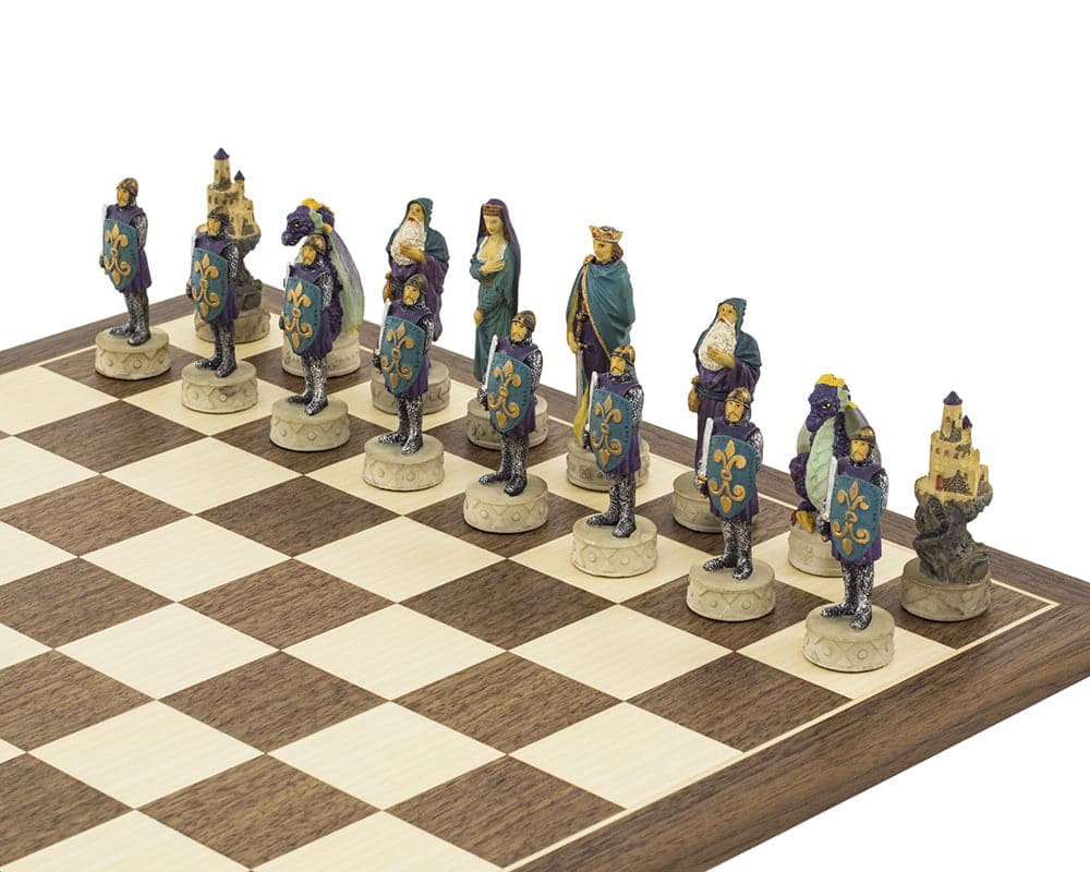 Medieval hand painted chess set with exquisitely detailed pieces on a Spanish board.