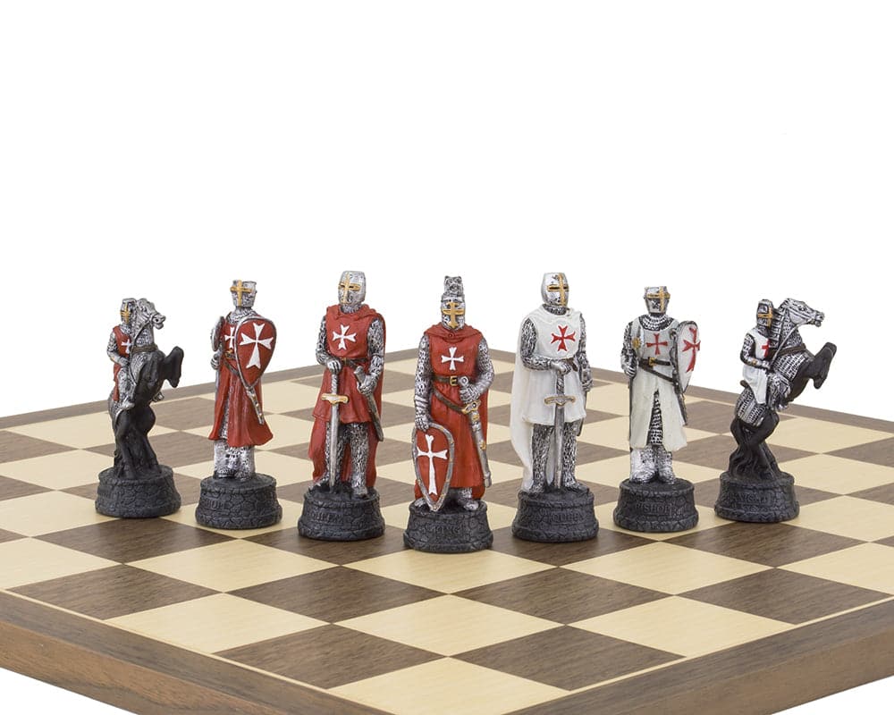 The Crusader Hand Painted Chess Set by Italfama featuring detailed knight pieces on a chessboard.