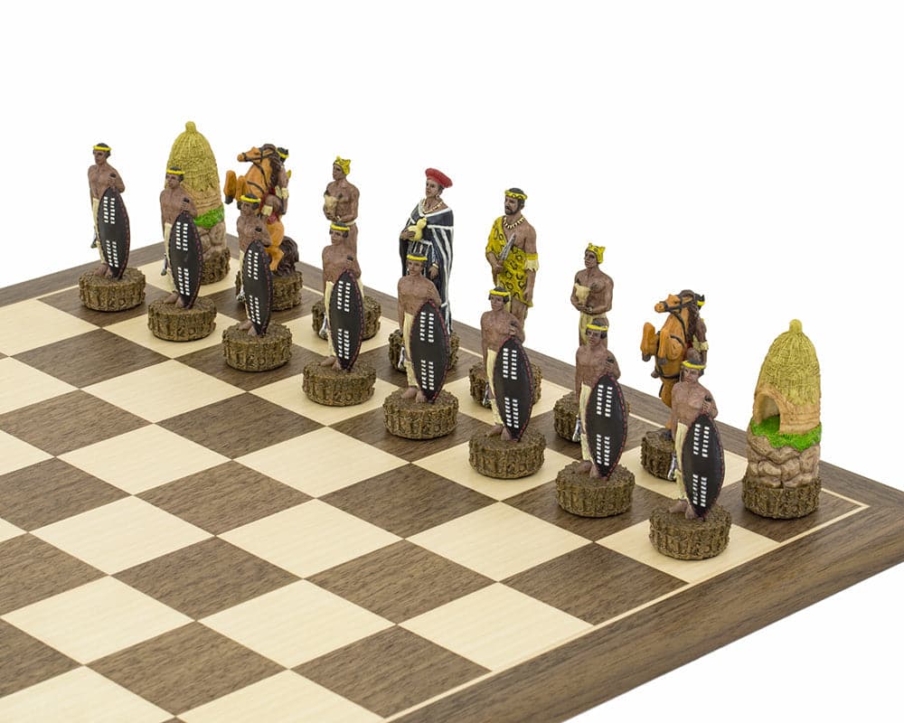 Hand-painted British vs Zulus themed chess set on 15.75 inch walnut and maple board, crafted by Italfama in Italy.