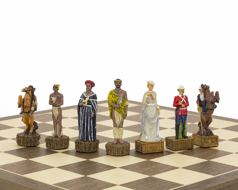 Hand-painted British and Zulu themed chess pieces on walnut and maple board, featuring King Cetswayo and Lord Chelmsford by Italfama.