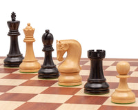 The Leningrad Mahogany Chess Set showcasing intricately detailed pieces, including a 2.8-inch king, crafted by Italian artisans on a checkered board.