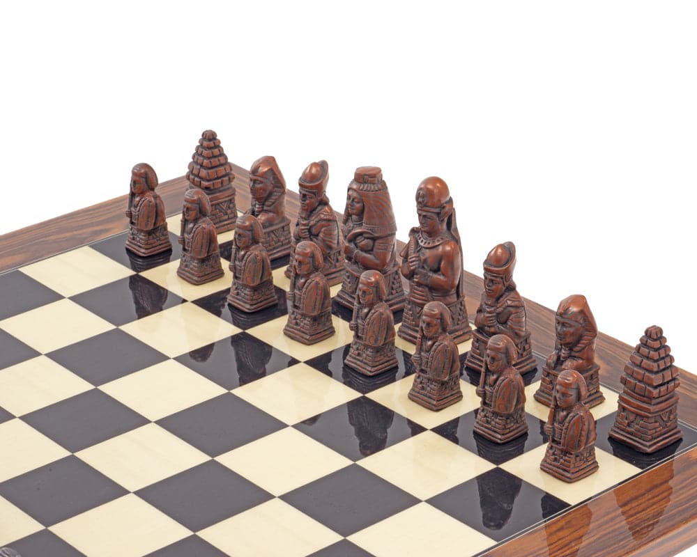 Egyptian Metal and Palisander Chess Set with detailed chess pieces on checkered board.