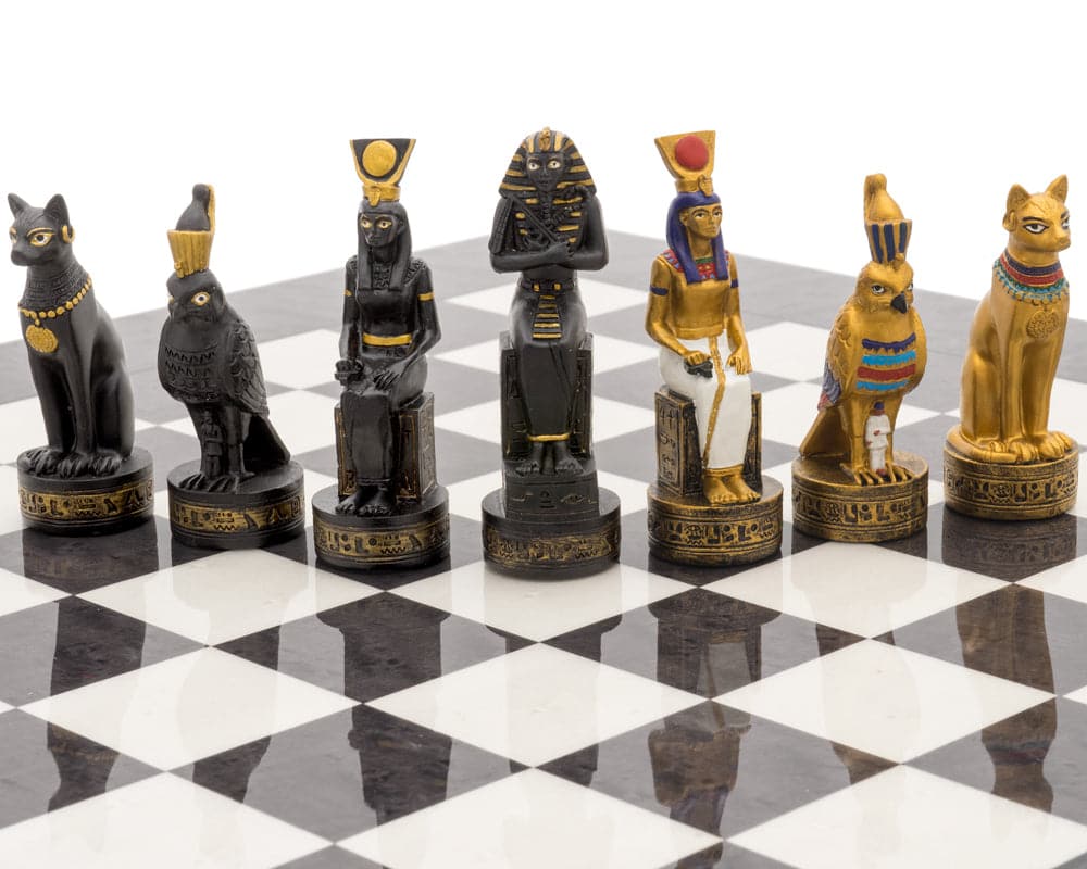 Ancient Egypt hand-painted chess pieces on high-gloss luxury chess board, part of the Italfama luxury charcoal chess set