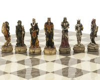 Hand-painted resin chess pieces from The Zombie and Grey Ash Deluxe Chess Set on a glossy grey ash burl board