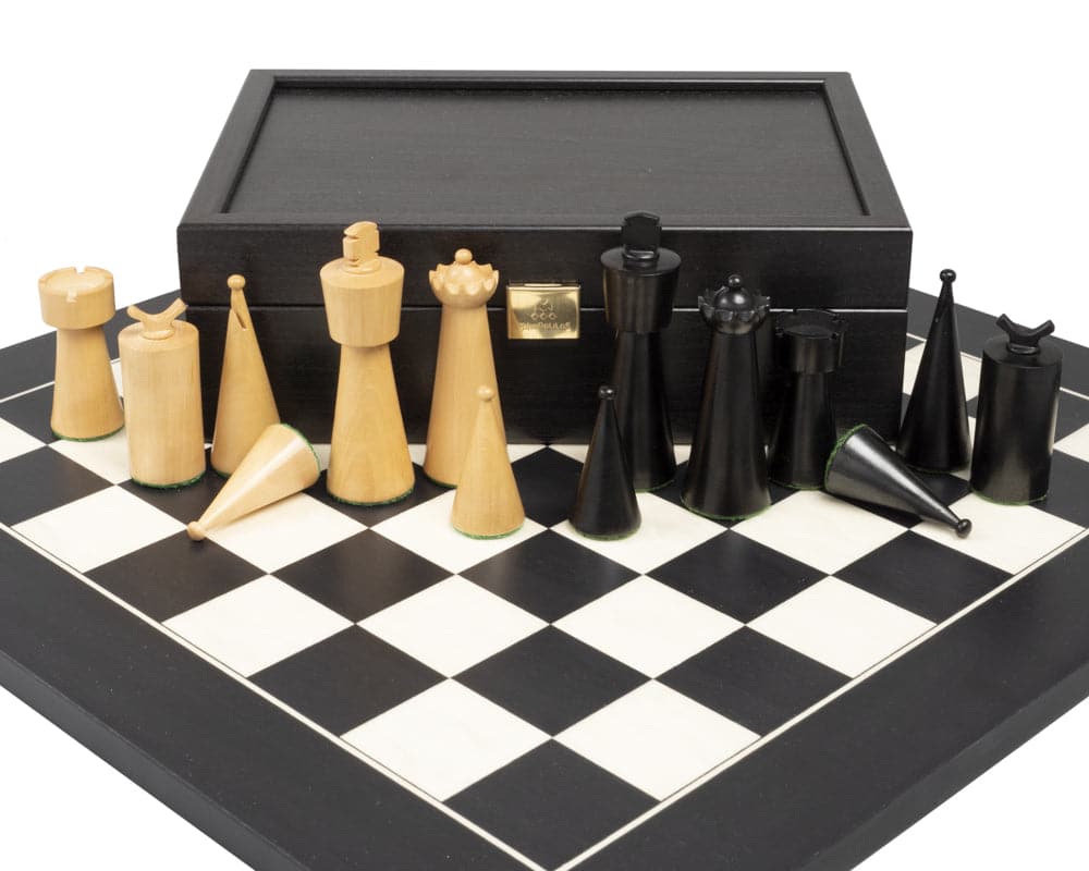 Art Deco Black Chess Set with black and natural wood chess pieces on a black and white chessboard with storage box.