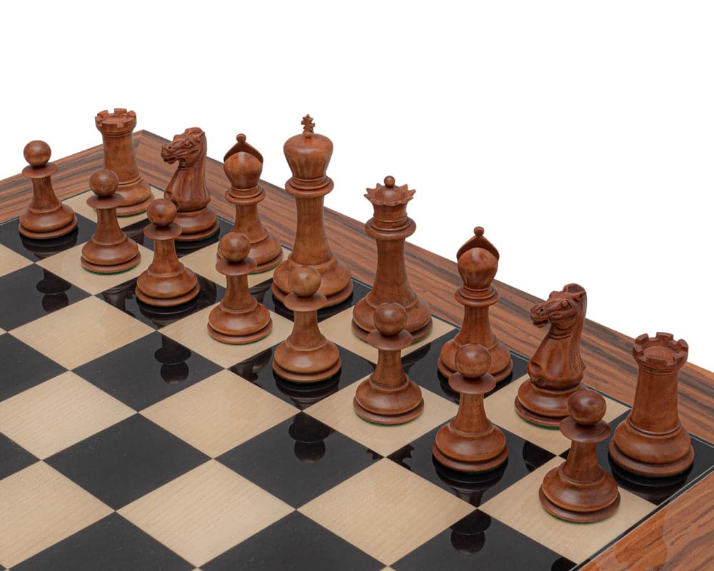 1849 Reproduction Staunton Chess Set with ebony and antiqued boxwood pieces on a 23.6 inch Spanish board. Luxurious chessmen and board.