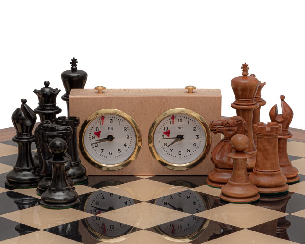 The 1849 Reproduction Staunton Ebony and Palisander Luxury Chess Set with clock on a Spanish board